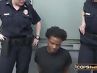 Female officers with juicy fun bags love to lick black male pole