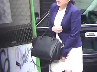 Asian babe squatting