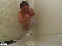 Whore Takes A Shower Spreads Legs Gags And Cleans And Shows Her Shaved Fuck Holes